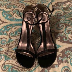 Sparkly black T-strap heels